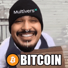 a man with a beard wearing a hat that says multivers x