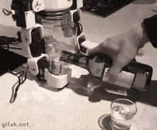 Cheers Dude GIF - Robot Shots Drinking GIFs
