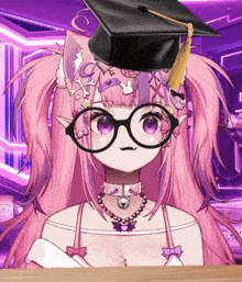a girl wearing glasses and a graduation cap