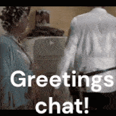 a woman with curlers on her head is talking to a man in a white shirt with the words greetings chat below her