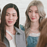 two women are standing next to each other and the words lingonoises are on the bottom right