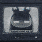 a black and white photo of a cartoon character on a tv screen .