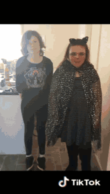 two girls are standing next to each other with a tiktok watermark on the bottom