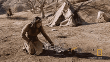 Making A Fire The Great Human Race GIF - Making A Fire The Great Human Race Building A Fire GIFs