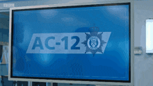 a screen displays a logo for the central force