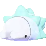 a white and blue cartoon character with a black eye is laying down on the ground .
