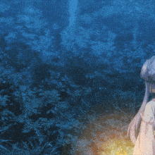 a girl in a white dress is holding a lantern in the woods