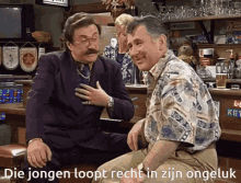 two men are sitting at a bar and the words die jongens loopt recht in zijn ongeluk are written below them