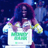 a woman holding a briefcase that says money bank