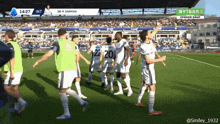 a group of soccer players on a field with the numbers 22 20 on their jerseys