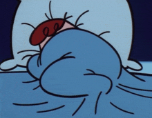 a cartoon character is laying in bed with a blue blanket