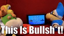 two stuffed animals playing a video game with the words " this is bullsh * t "