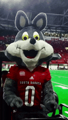 a mascot wearing a south dakota jersey