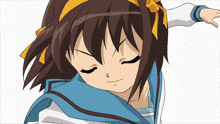 a close up of a girl with her eyes closed and a yellow ribbon around her head