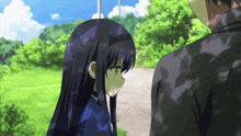 a man and a girl are standing next to each other