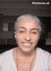 a woman wearing headphones and a white shirt is smiling and making a funny face .