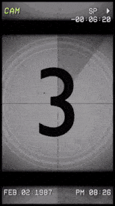 the number 3 is displayed on a screen with the date feb 02 1987