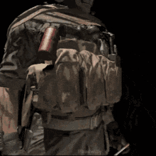 a close up of a soldier 's back with the name badwilly on the bottom right
