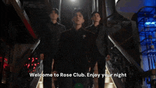 a group of men are walking down stairs with the words welcome to rose club enjoy your night