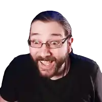 a man with glasses and a beard making a funny face