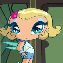 a little girl with blonde hair and blue eyes is standing in front of a green wall