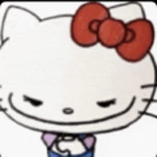 hello kitty with a red bow on her head is smiling .