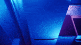 a blue light is shining on a door that is open