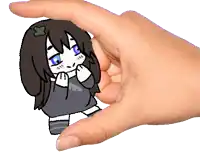 a hand is holding a drawing of a girl with long hair