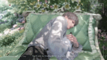 a video of a man sleeping with the words " you 'll only be filming xavier in a land of dreams " visible