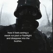 a black and white photo of a man wearing a gas mask and a helmet