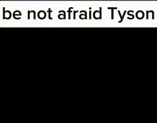 a sign that says be not afraid tyson with a picture of a colorful mask
