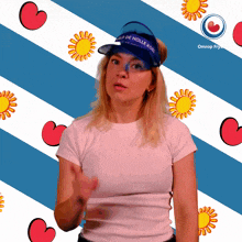 a woman wearing a visor that says " old de holle kol " on it