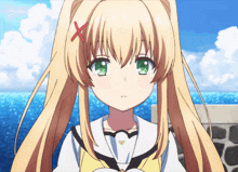 a girl with blonde hair and green eyes has a red x on her forehead