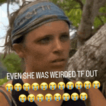 a woman wearing a headband with the words " even she was weirded tf out " on it