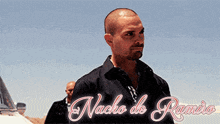 a man with the name nacho de ramiro written on the bottom