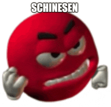 a red smiley face with a very angry expression and the words chinesen written on it .
