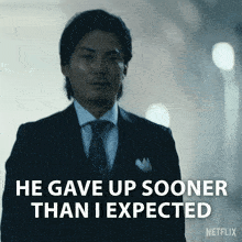 a man in a suit and tie says he gave up sooner than expected