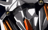 a close up of a robot 's face with orange and white lines