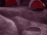 a close up of a sonic the hedgehog standing in a rocky area