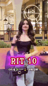 a woman is standing in front of a sign that says rit 10 on it