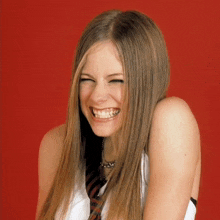 Avril Lavigne Giggle GIF - Avril Lavigne Giggle Evil Laugh GIFs