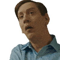a man in a blue shirt has a surprised expression on his face