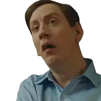 a man in a blue shirt has a surprised expression on his face