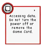 a red and white sign that says " accessing data do not turn the power off or remove the game card "