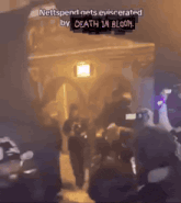 a group of people are standing in front of a building with the words " nettspend gets evicted by death in bloom "