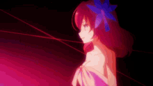 a girl with red hair has a blue flower in her hair .