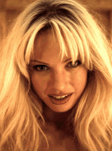 Lily James Pamela Anderson GIF - Lily James Pamela Anderson Hes Beautiful GIFs