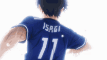 a soccer player with the name isagi on the back of their jersey