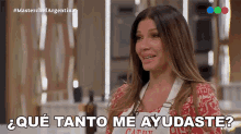 a woman says " que tanto me ayudaste " while wearing an apron