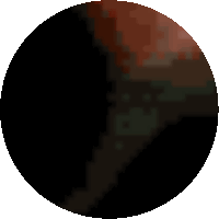 a pixelated image of a black circle with a red center
